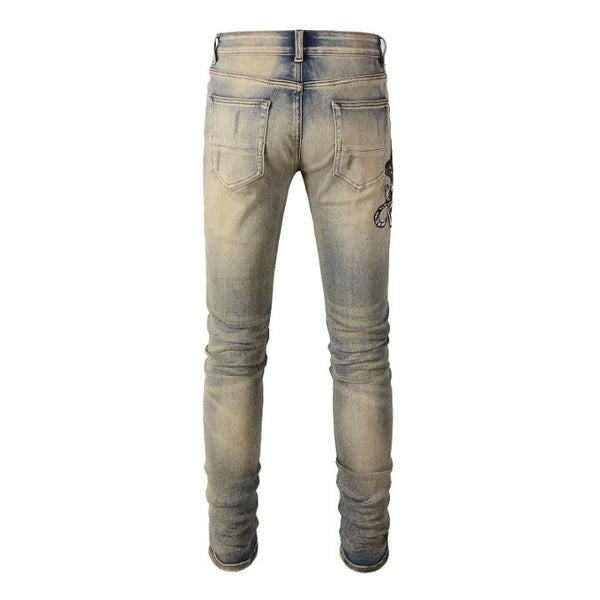 Distressed Light Blue and Faded Yellow Slim Fit Jeans with Embroidered Snake